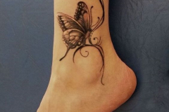Татуировка : Бабочка на голени (икре)